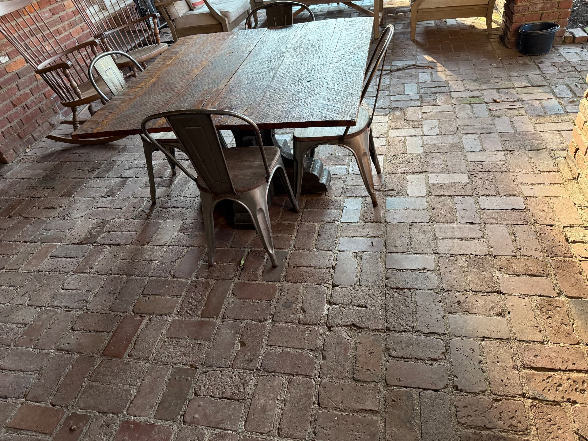 Brick patio before pressure washing
